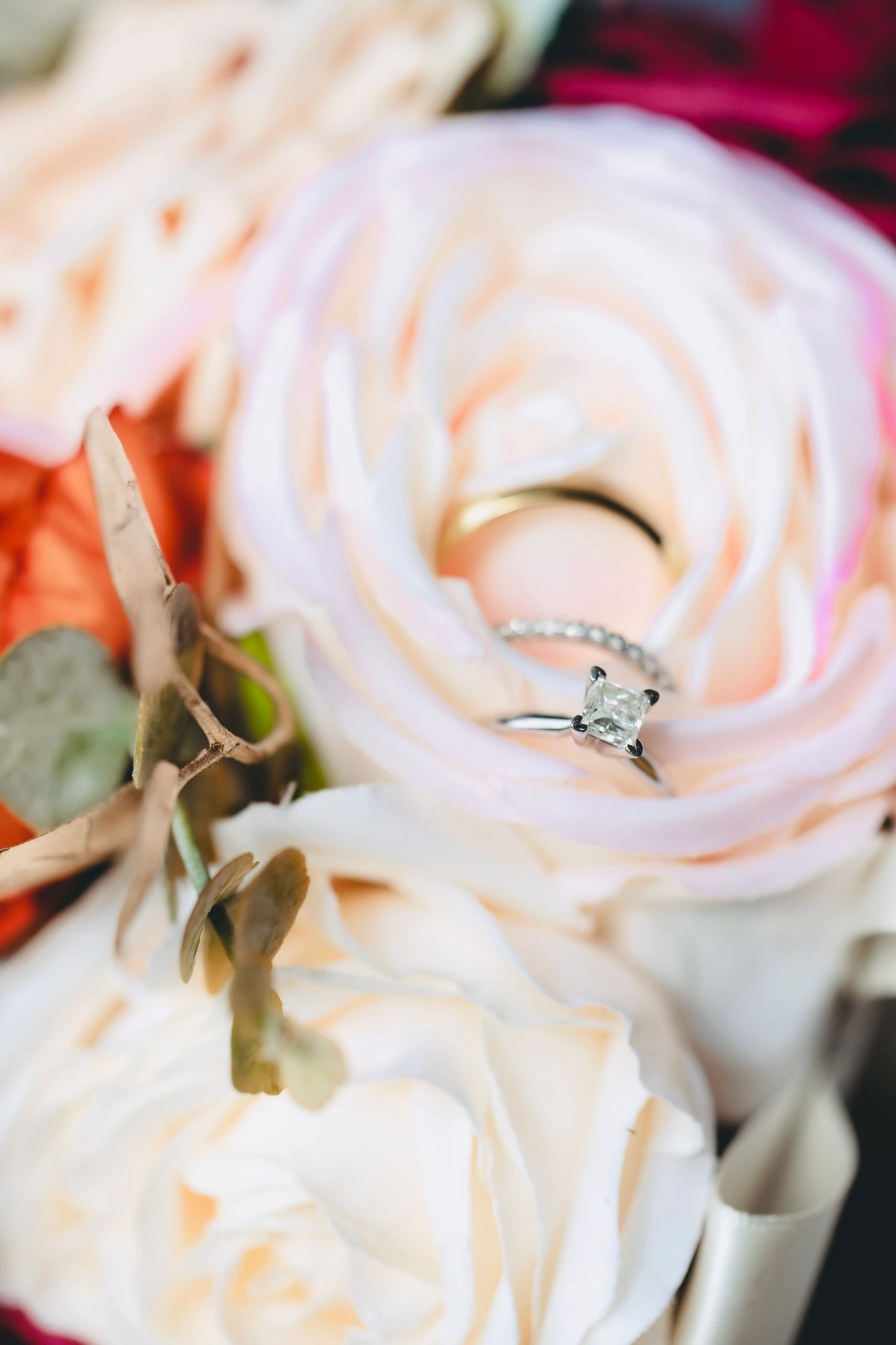 Engagement ring on roses
