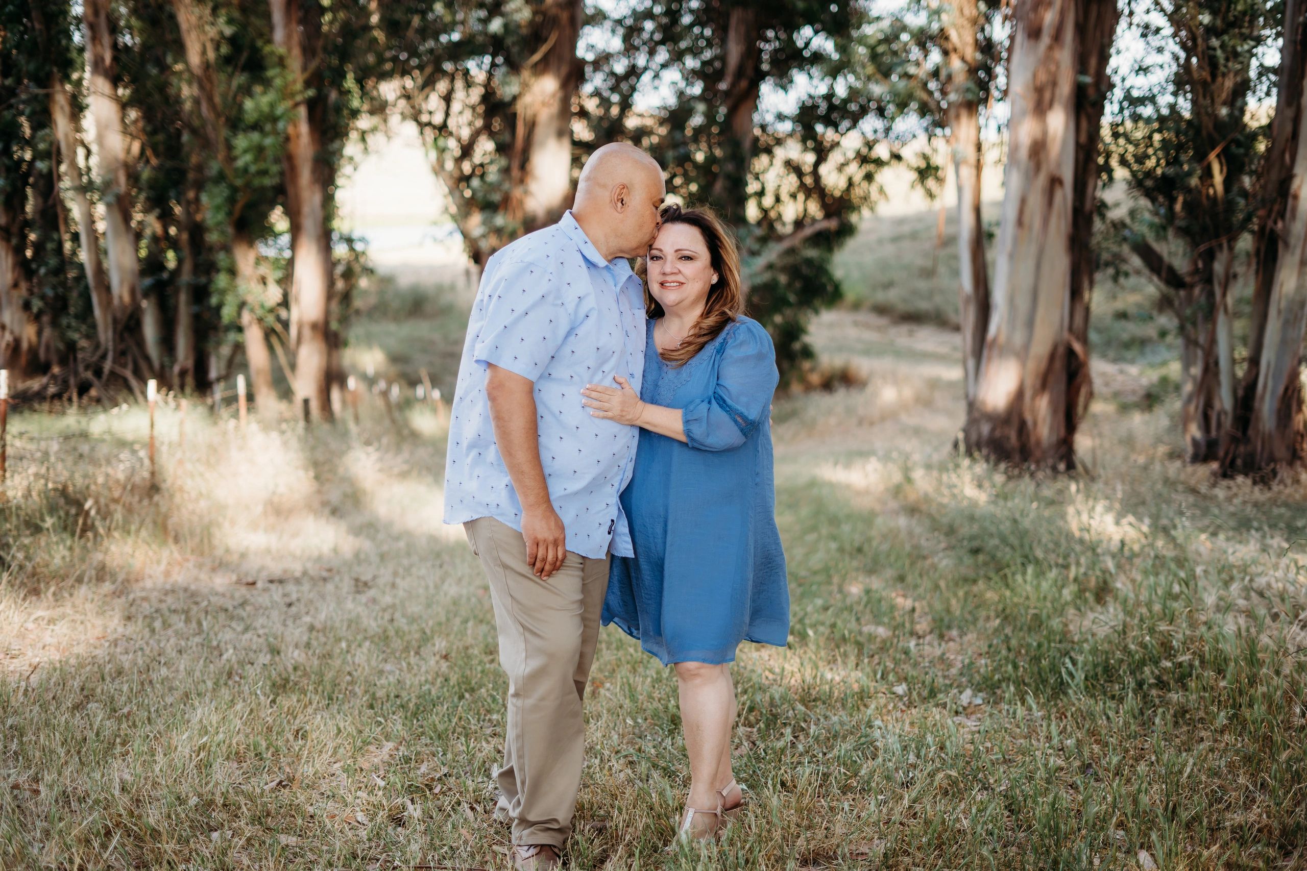 Marcia and Carlos walking together outdoors